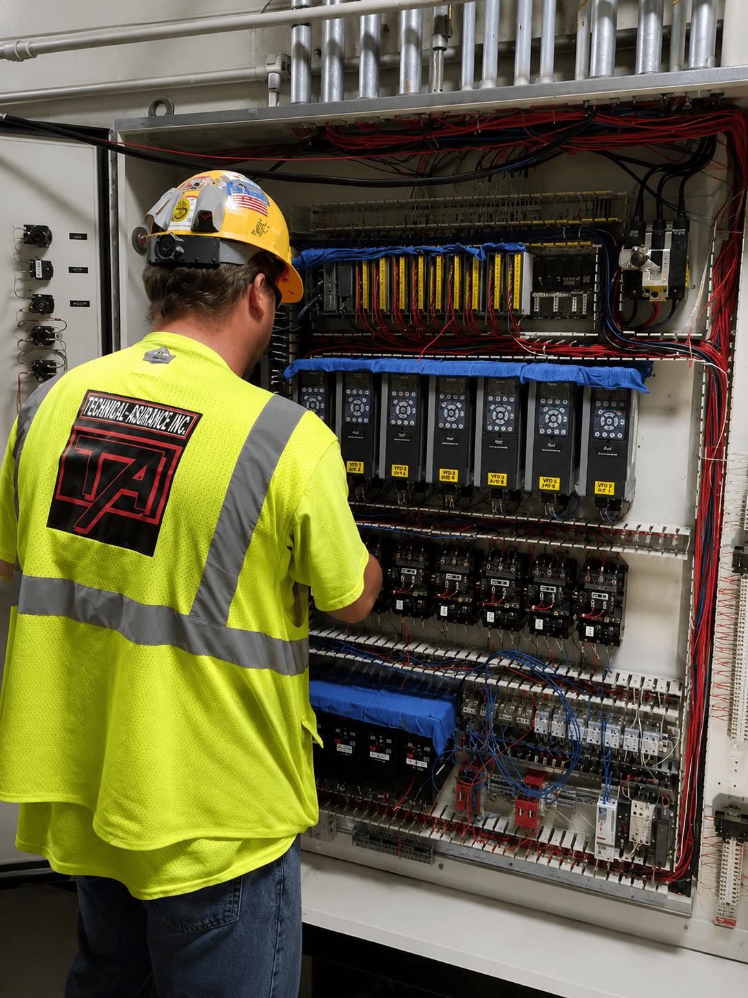 Terminal-Andrae engineering technician working inside an electrical control panel